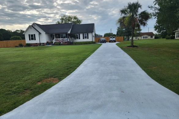 New concrete driveway with broom finish